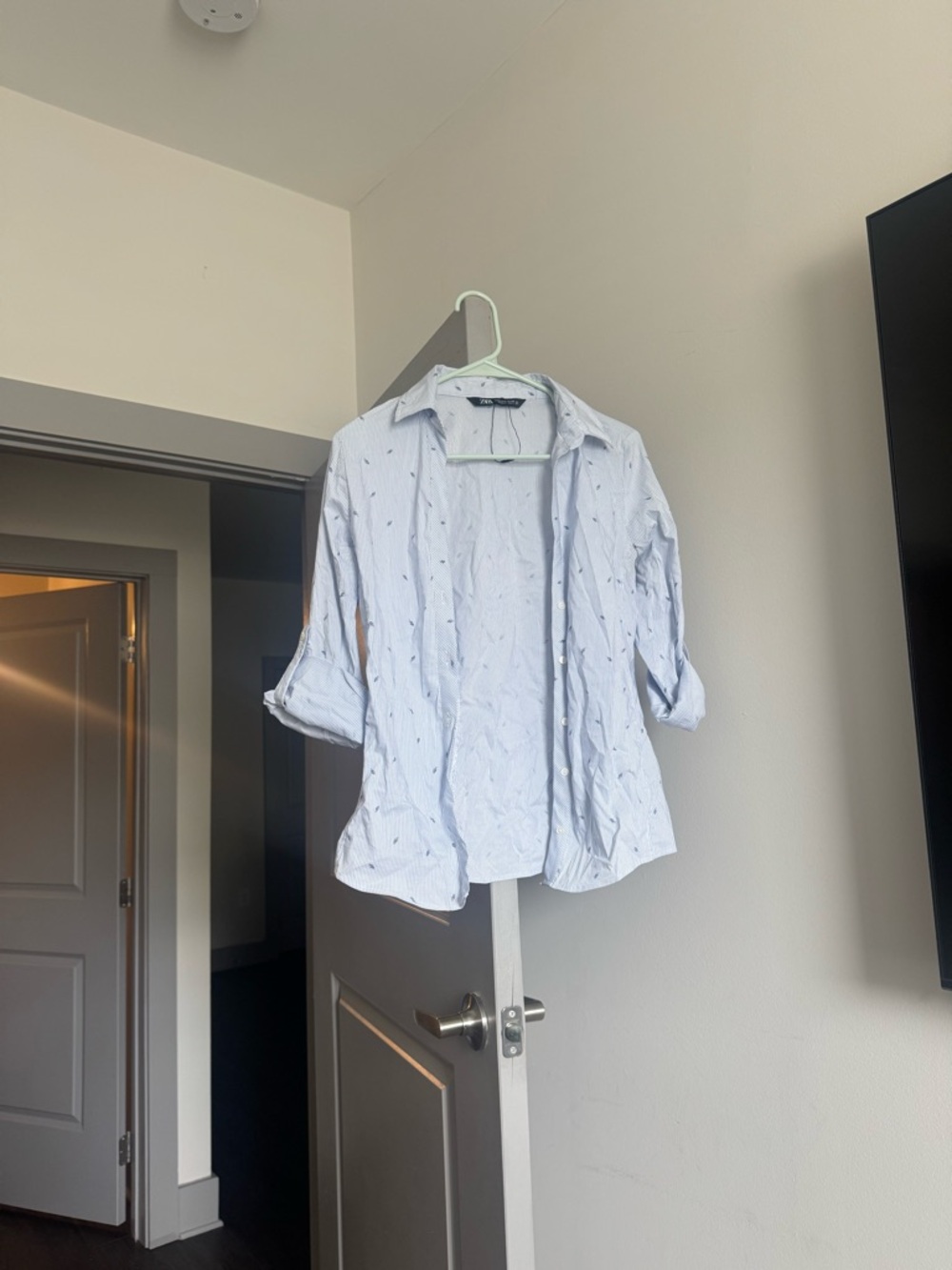 Light Blue Men's Button-Up Shirt with Subtle Print